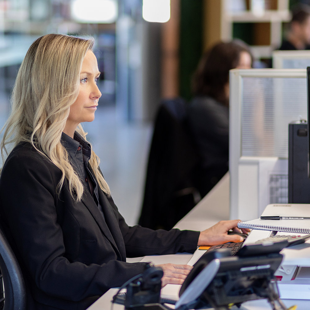 Lending manager working on a loan approval