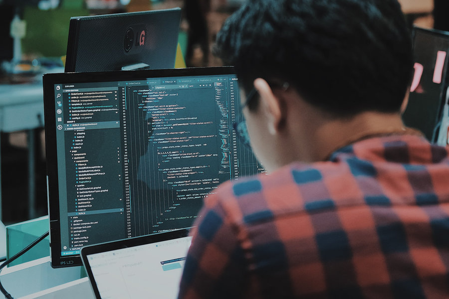 Person in front of their computer doing software development
