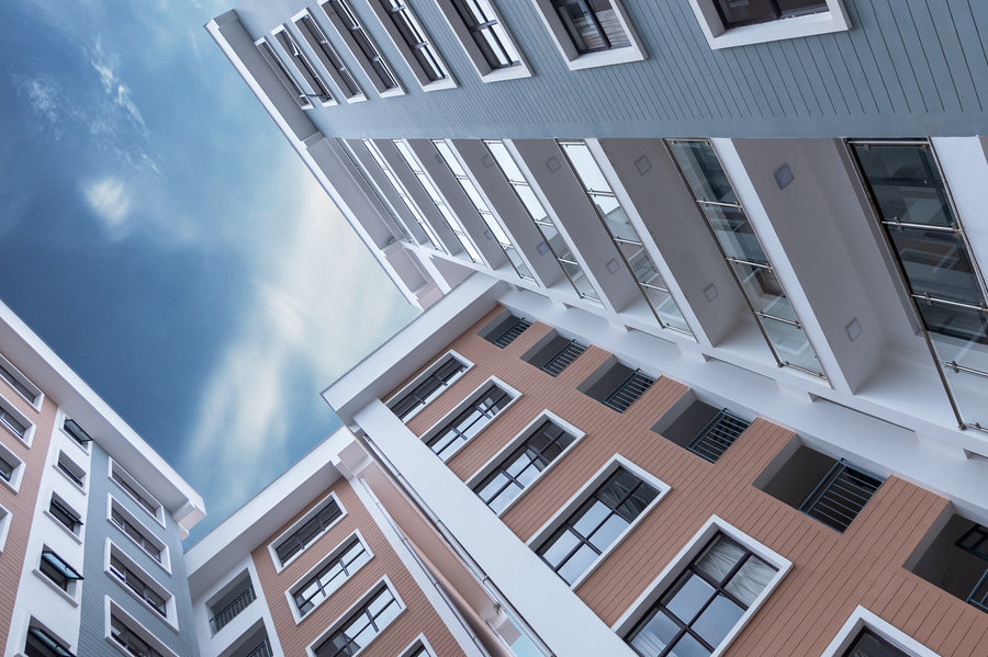 Look up at a new apartment building from street level