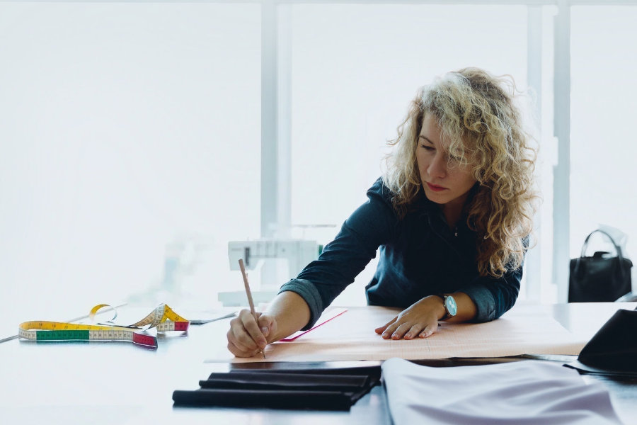 Apparel designer working on a garment pattern