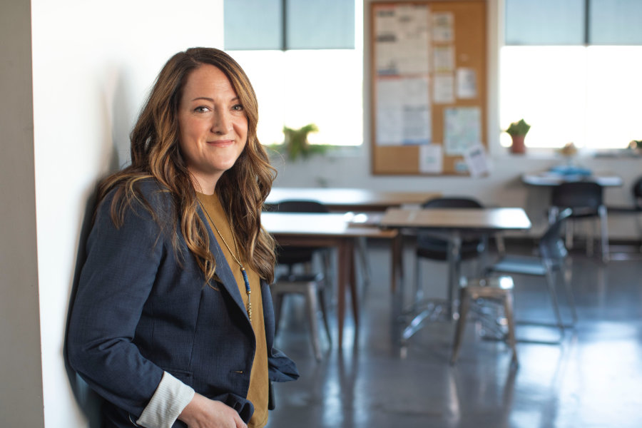 educator standing in the door of a new training facility