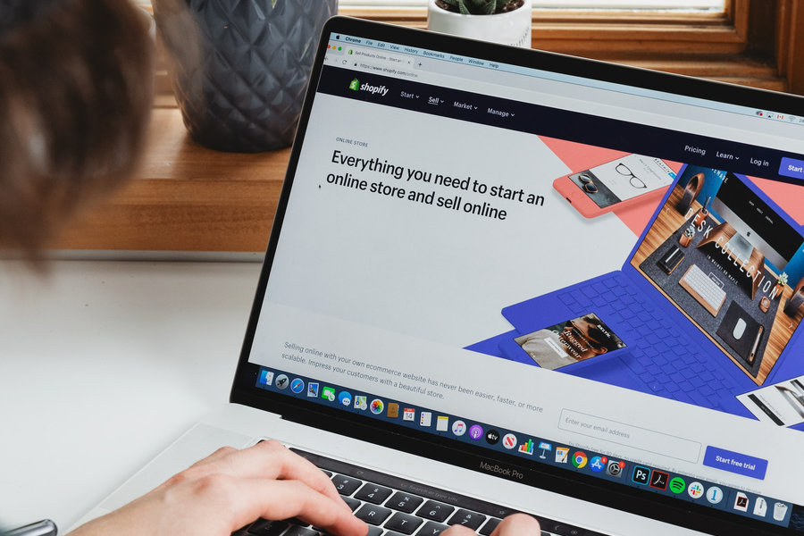 Online retail store concept, person using a laptop