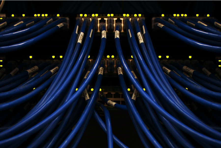 Large network switch full of cables