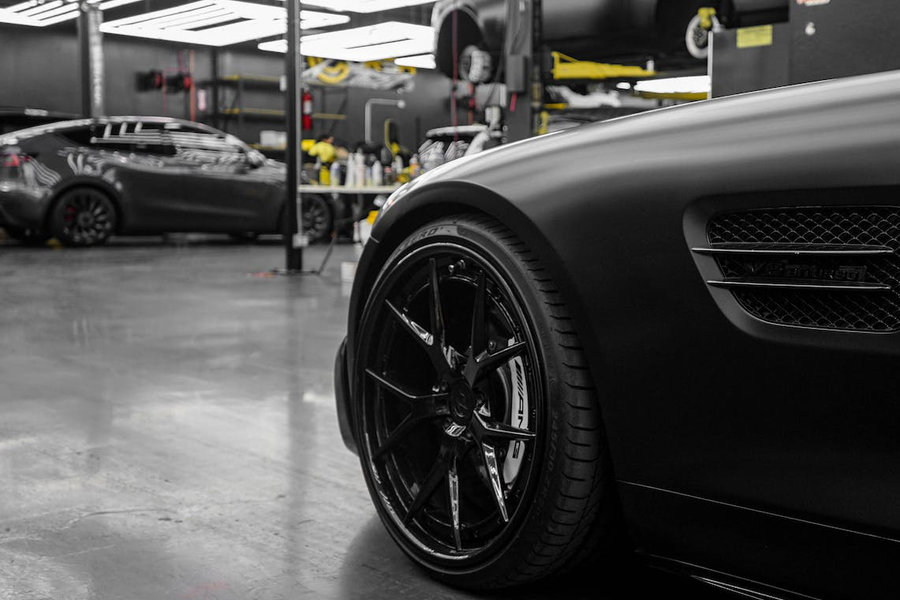 Vehicles in a smash repair workshop