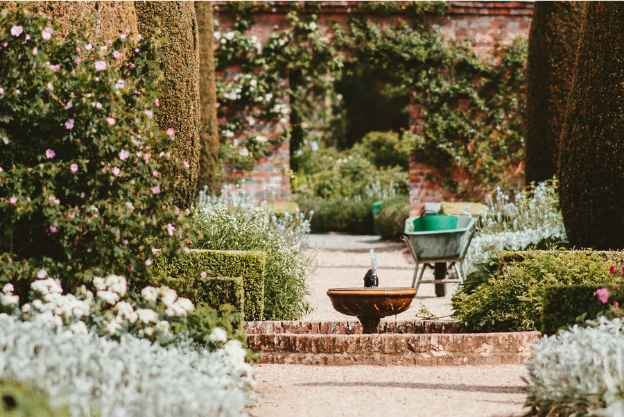 garden path surrounded by formal gardens
