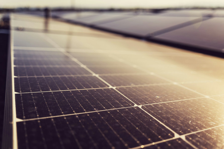 Close up to solar panels at sunset
